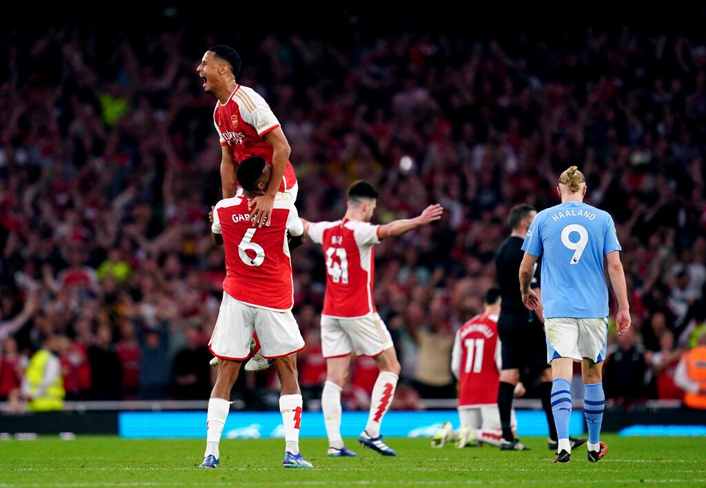 Arsenal's William Saliba (top) and Gabriel celebrate at the end of their Premier League match against Manchester City at the Emirates Stadium, London. Photograph: John Walton/PA Wire