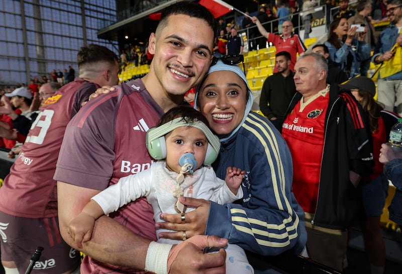 Thaakir Abrahams with wife Tasneem and daughter Diyaana in La Rochelle. Photograph: Billy Stickland/Inpho