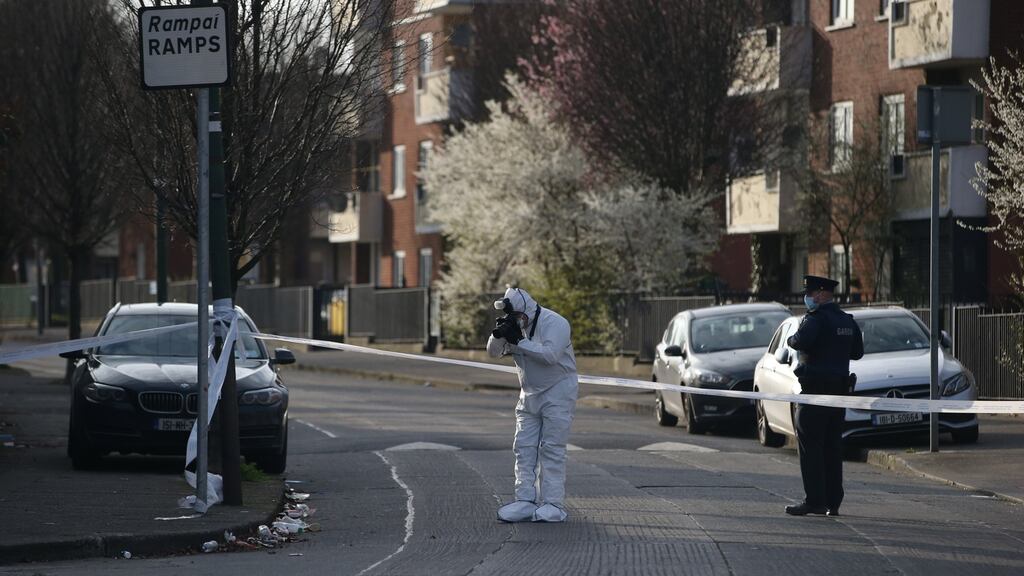 Gardaí at the scene of a shooting at Bernard Curtis House, a flat complex in the Bluebell area of Dublin at the weekend. Photograph: Stephen Collins/Collins Photos