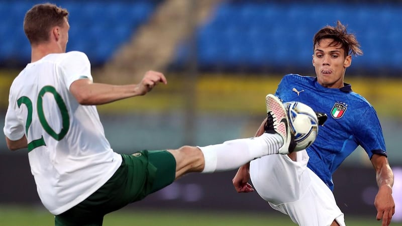 Samuele Ricci of Italy in action against Ireland’s Jack Taylor during the game in Pisa. Photograph: Gabriele Maltinti/Getty Images