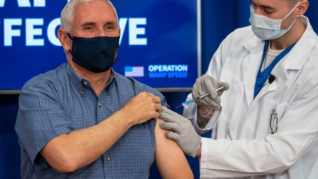 US vice-president Mike Pence receives a COVID-19 vaccine to promote the safety and efficacy of the vaccine at the White House. Photograph: Doug Mills-Pool/Getty