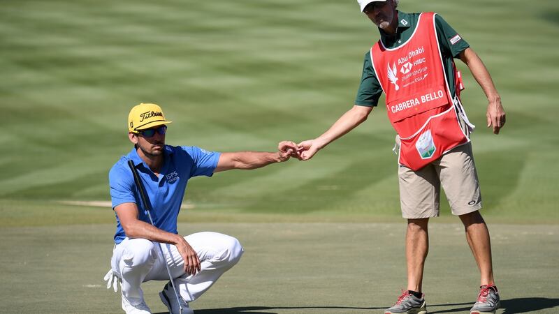 Colin Byrne caddying for Rafa Cabrera-Bello during the Abu Dhabi HSBC Championship in January. Photo: Ross Kinnaird/Getty Images