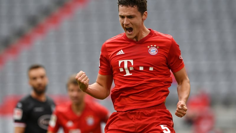 Benjamin Pavard celebrates after scoring Bayern’s second in their 5-0 win over Fortuna Dusseldorf. Photograph: Christof Stache/Getty