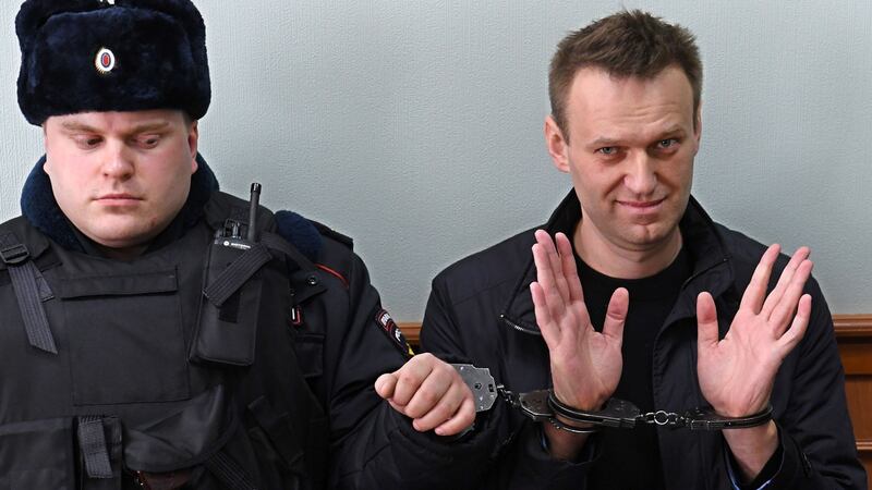 A shot from on March 30th last shows Kremlin critic Alexei Navalny, who was arrested during a March 26th anti-corruption rally, gesturing during an appeal hearing at a court in Moscow. Photograph: Kirill Kudryavtsev/AFP/Getty Images
