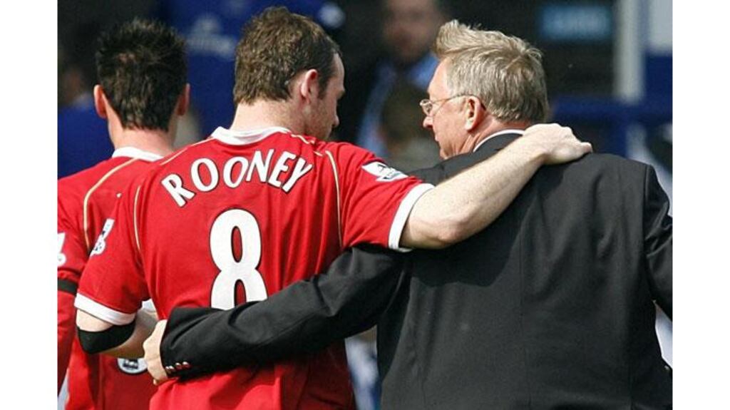 Business as usual: Manchester United's Wayne Rooney and Alex Ferguson. The England striker has agreed a new five-year deal to stay at Old Trafford (Photograph: Peter Byrne/PA Wire)