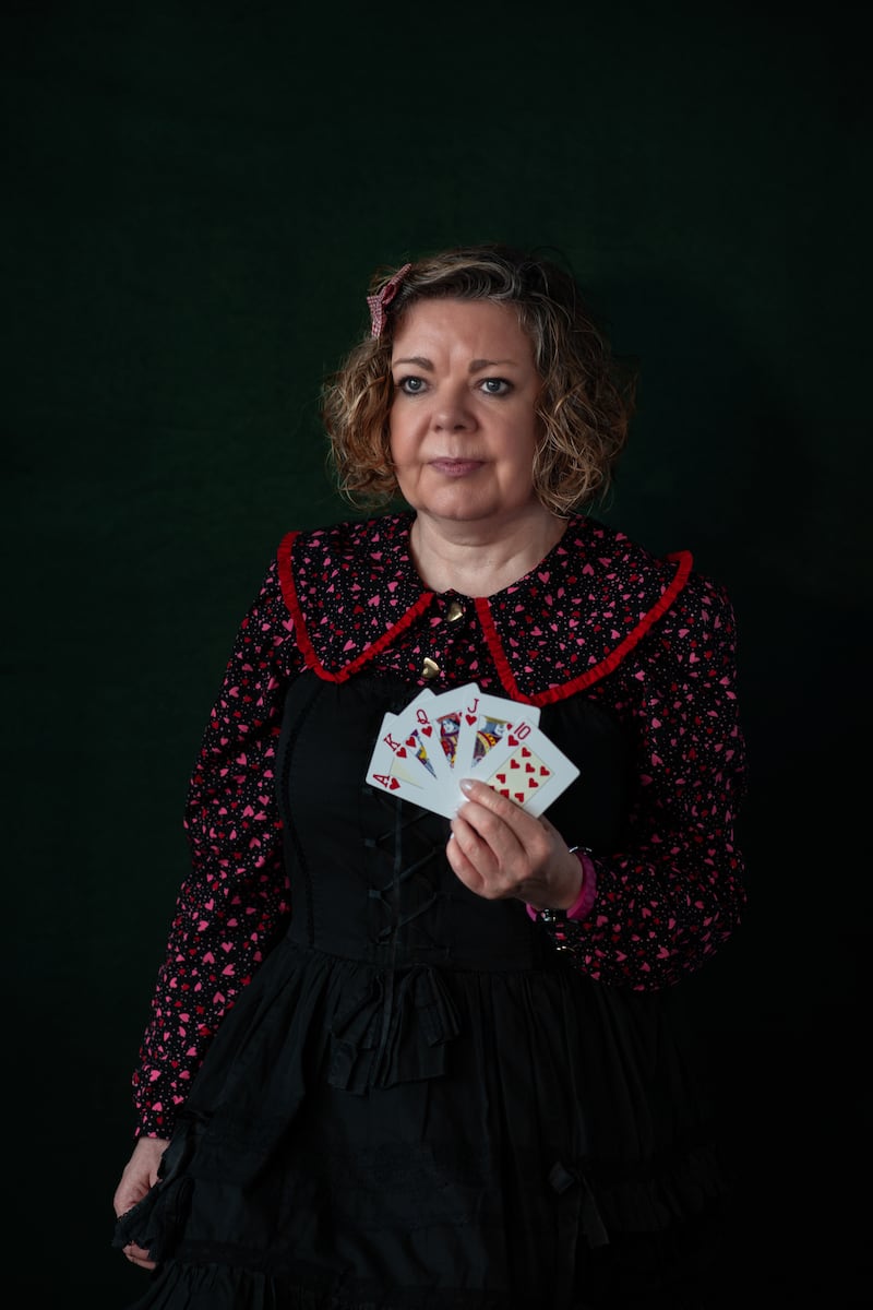 Bridie Gribbin with the cards she used to play with her brothers. Photograph: Deirdre Brennan