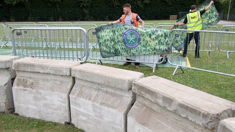 Concrete bollards and security gates are seen in the public queueing zone outside   Wimbledon. Following the terror attacks on London, this year’s  tournament will see increased security measures to protect visitors. Photograph: Leon Neal/Getty Images