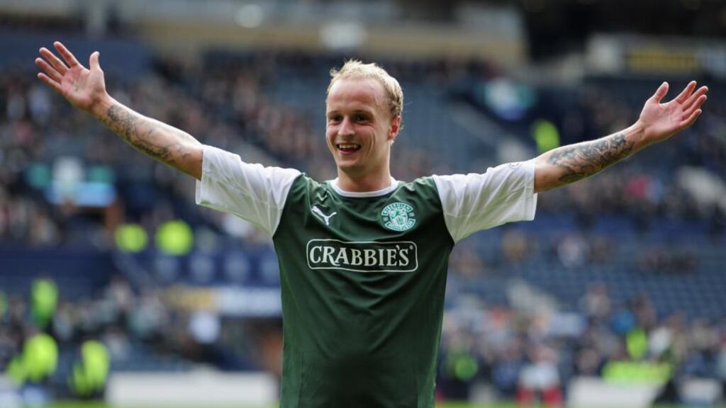 Leigh Griffiths celebrates the winning goal for Hibernian during The William Hill Scottish Cup semi-final between Falkirk and Hibernian at Hampden Park. Photograph: Jamie McDonald/Getty Images