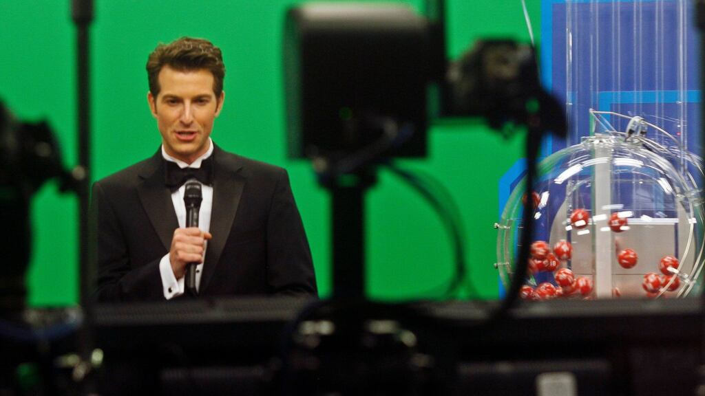 Host Sam Arlen presents the Florida Lottry live on TV in Tallahassee as the Powerball number is about to be chosen. Photograph: Philip Sears/Reuters