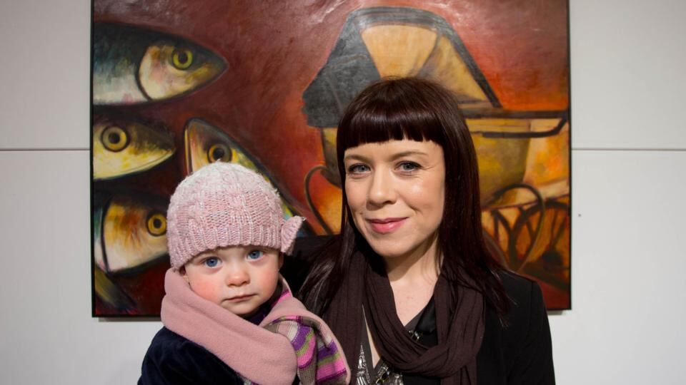 Pride of place: artist Gillian Kenny with her daughter Millie Shinnors at the ‘Personal Choice’ exhibition. Photograph: Alan Place