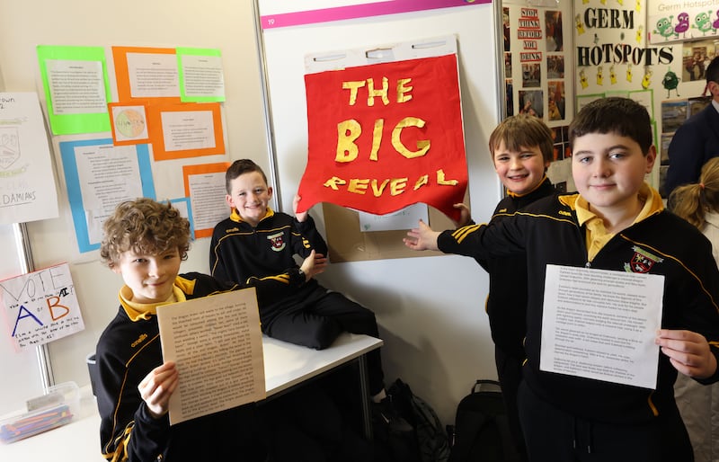 Students from St Damian’s NS, Dublin, from left, Rory, Morgan, Fionn and James, with their project Human vs AI; Can you tell the difference, at the BT Young Scientist & Technology Exhibition, at the RDS, Ballsbridge, Dublin. Photograph: Dara Mac Dónaill