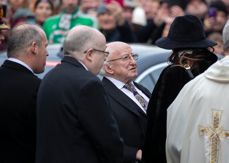 President Michael D Higgins consoles Shane MacGowan's wife, Victoria Mary Clarke, at the singer's funeral. Photograph: Colin Keegan, Collins Dublin