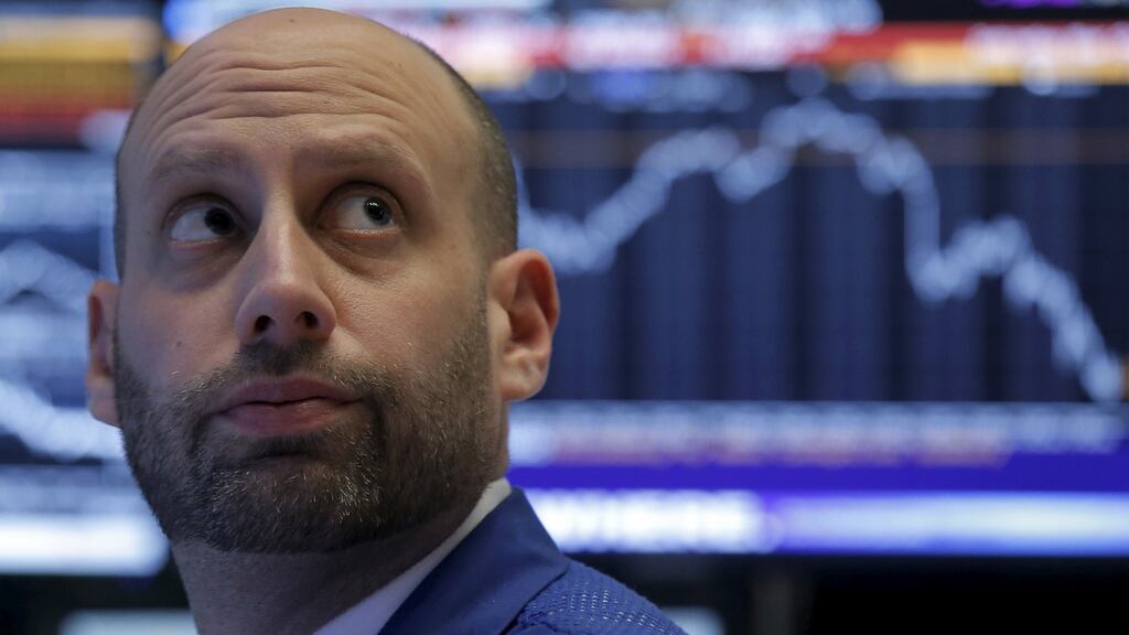 NYSE trader: allocating to equities will still make sense in 2016. Photograph: REUTERS/Brendan McDermid