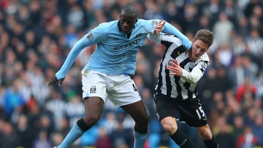 Yaya Toure has signed a new contract with Manchester City that will see him stay with the club until 2017. Photograph: Alex Livesey/Getty Images
