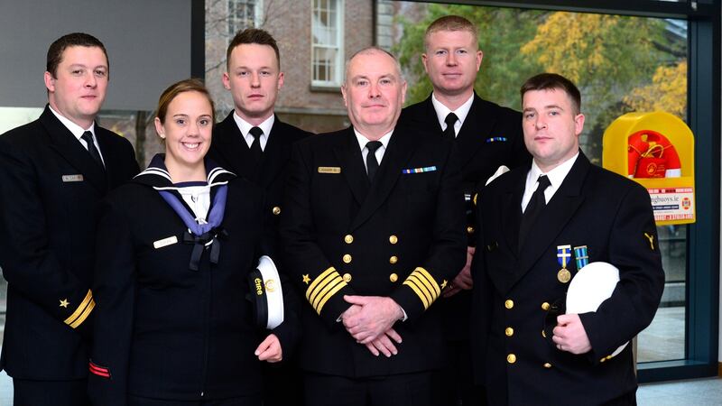 Members of the Irish Navy who were honoured at Dublin Castle: Ruairí de Barra (centre) with Catherine Dwyane (left front) and Dwayne Philbin (right front) with (back from left) Niall McCarthy, Dave McKenna and David Barry. Photograph: Cyril Byrne