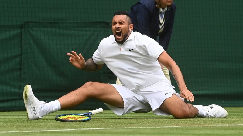 Nick Kyrgio falls during his first round win over Ugo Humbert at Wimbledon. Photograph: Facundo Arrizabalaga/EPAY