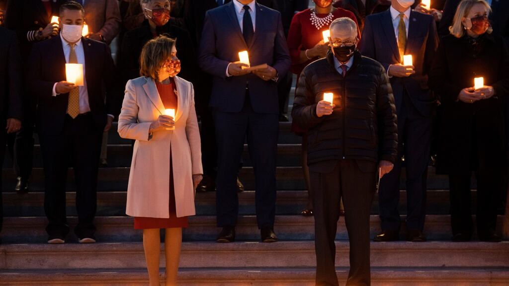 Members of the US House and Senate in a Moment of Silence for 800,000 American Lives Lost to Covid-19 at the US Capitol in Washington. Photograph: Shawn Thew/PA