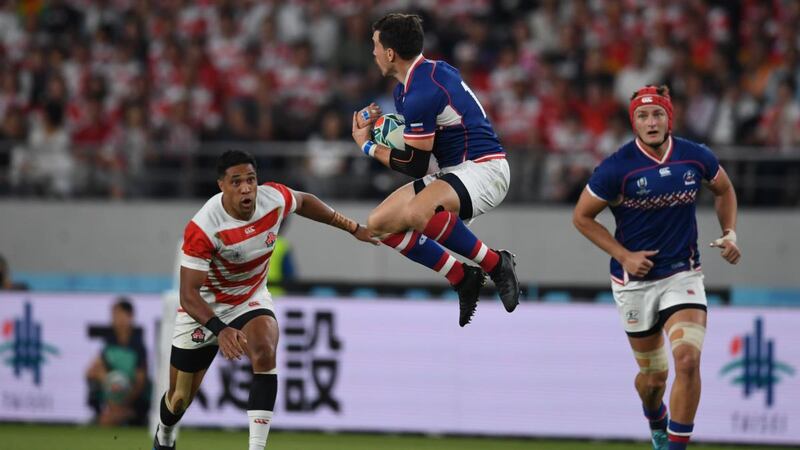 Russia fullback Vasily Artemyev jumps to collect the ball  during the  Rugby World Cup Pool A match against Japan at Tokyo Stadium. Photograph:  Charly Triballeau/AFP/Getty Images