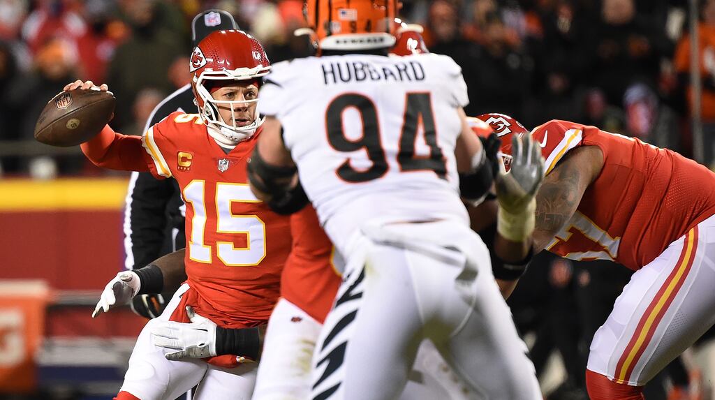 Kansas City Chiefs quarterback Patrick Mahomes (L) throws against the Cincinnati Bengals. Photograph: Dave Kaup/EPA