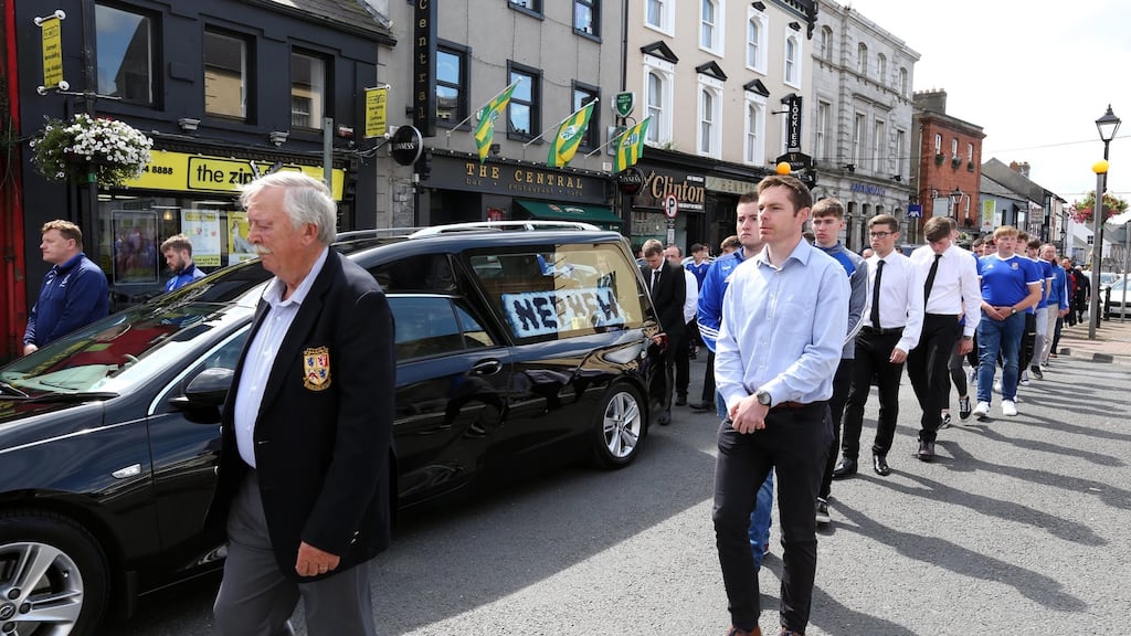 Friends form a guard of honour as the cortege makes its way to the cemetery after the funeral of 15-year-old Michael (Mikey) Leddy who died last week in Lanzarote. Photograph: Colin Keegan, Collins Dublin