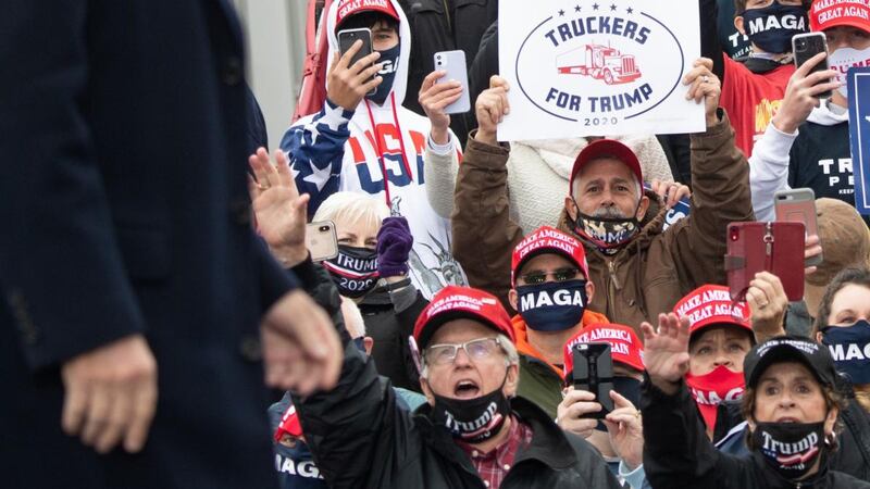 Supporters salute Donald Trump: His team spent $11 million on a 60-second ad during the Super Bowl in February. Photograph: Saul Loeb