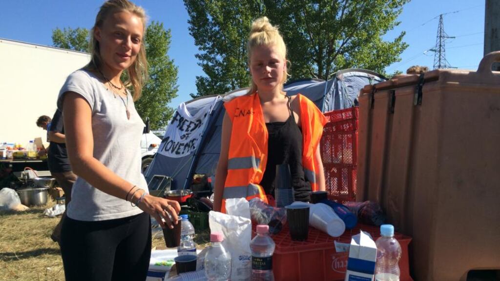 German students Joana and Louisa running a refreshment point for migrants. Photograph: Daniel McLaughlin