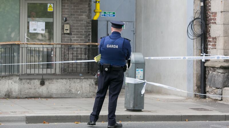 Gardaí at the scene of the assault on Sunday. Photograph: Gareth Chane/Collins