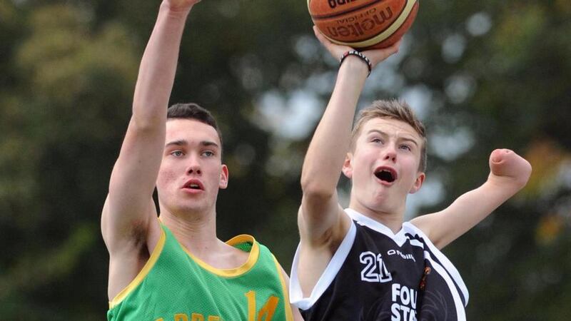 Despite having only one hand, Jordan Lee (14) has excelled at his chosen sport of basketball. Photograph: Eamonn Keogh/MacMonagle