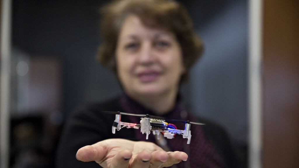 Dr Naira Hovakimyan of the University of Illinois with a small drone that may eventually be able to carry out household tasks, like retrieving a bottle of medicine, for older adults. Photograph: Daniel Acker/The New York Times