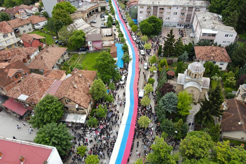 Hundreds of ethnic Serbs gathered in front of the city hall in their repeated efforts to take over the offices of one of the municipalities where ethnic Albanian mayors took up their posts last week. Photograph: Bojan Slavkovic/AP