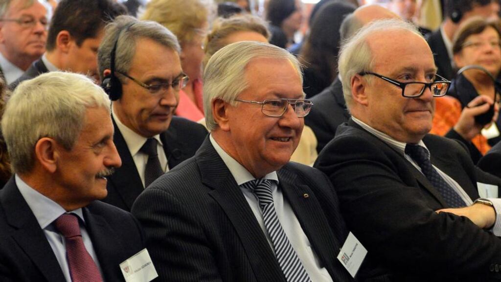 Former foreign minister Hubert Védrine (right), seen with former ministers Mikulas Dzurinda of Slovakia and Boris Tarasyuk of Ukraine, says France has been unable to reform itself. Photograph: Tibor Illyes/EPA