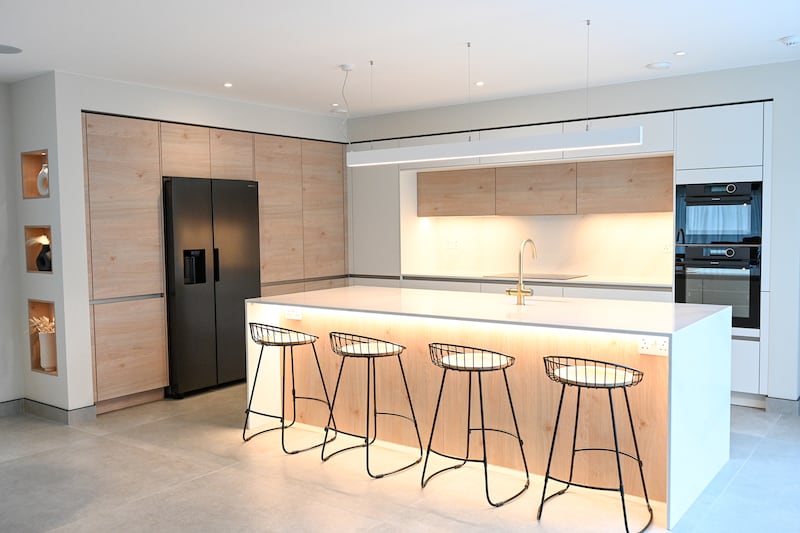 Don't forget to plan your lighting. Kitchen in Mallow by Kube.