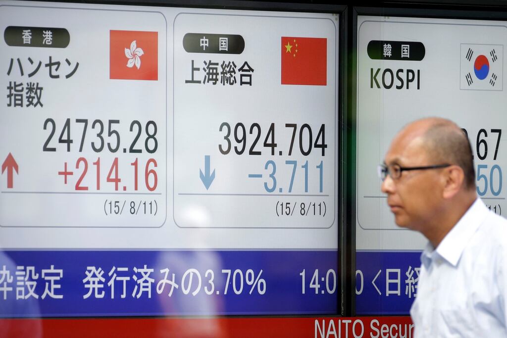 The yuan dropped 1.7 per cent in domestic trading after the central bank set its reference rate 1.6 per cent lower at 6.3306 per dollar. Photograph: Bloomberg