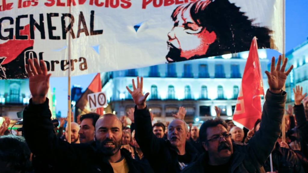 Metro workers at a rally in Madrid to protest against salary cuts. Photograph: Juan Medina/Reuters