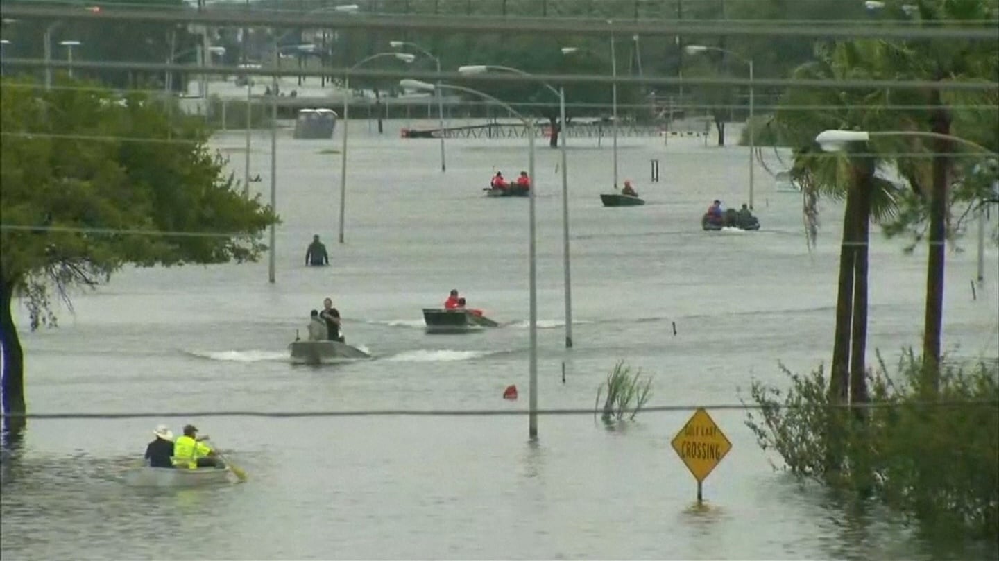 Rescue boats navigate flood waters of Tropical Storm Harvey in Port Arthur, Texas. Photograph: Greg Savoy/Reuters