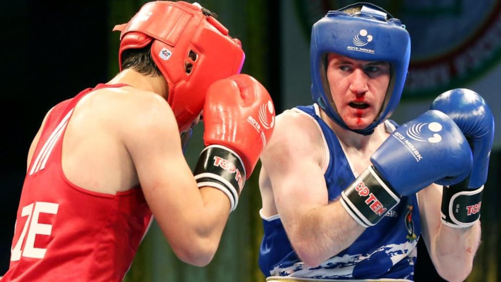 Ireland’s Paddy Barnes (blue) in action against Istvan Ungvari of of Azerbaijanin Minsk. Photograph: Cathal Noonan/Inpho