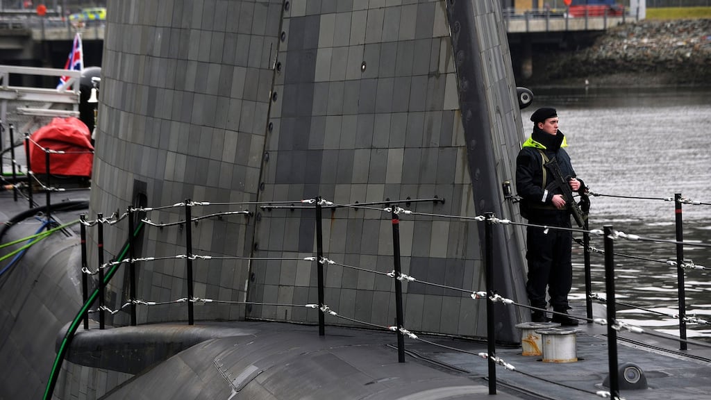 An armed guard on Astute-class nuclear submarine HMS Artful in 2016. The Royal Navy has not released information identifying which submarine was involved in the near-miss. Photograph: Andy Buchanan/AFP/Getty Images