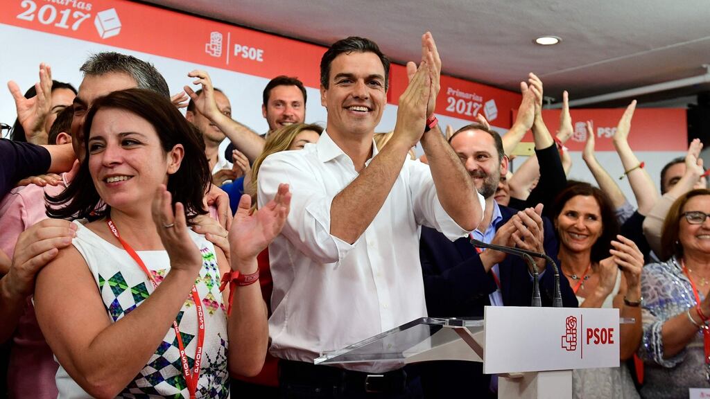 Pedro Sánchez applauds supporters at the PSOE headquarters in Madrid after winning the race for the party’s leadership. Photograph: Pierre-Philippe Marcou/AFP/Getty Images