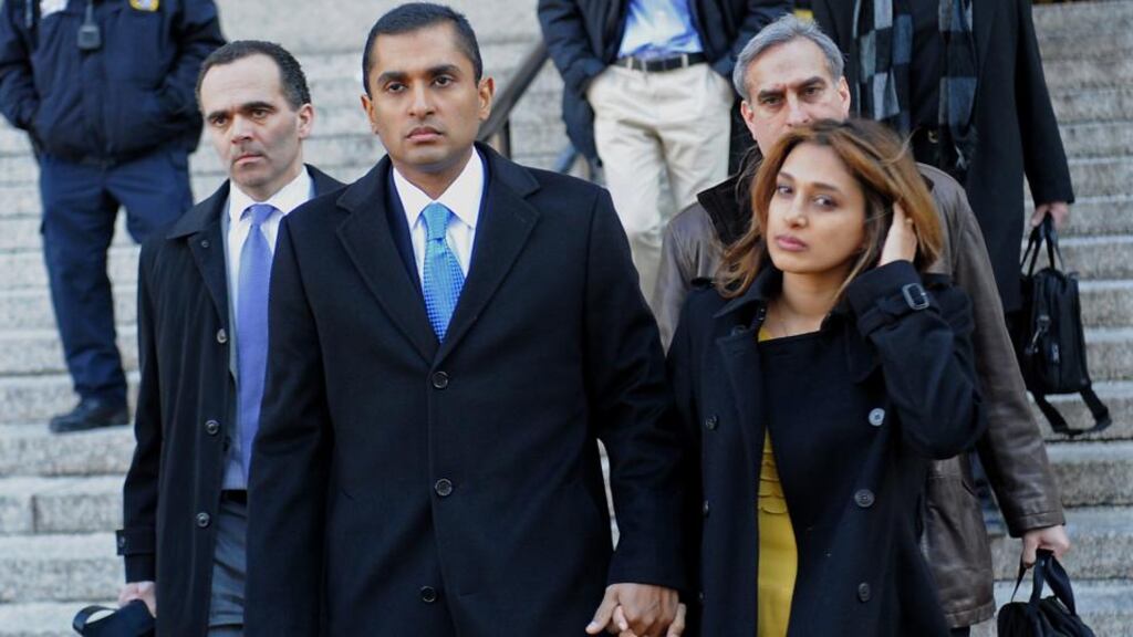 Mathew Martoma, a former SAC Capital Advisors fund manager exits federal court with his wife Rosemary Martoma, in New York, today after being found guilty in the most lucrative insider trading scheme ever. Photographer: Louis Lanzano/Bloomberg