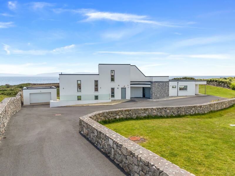 The property is totally private lying at the end of a driveway facing the sea