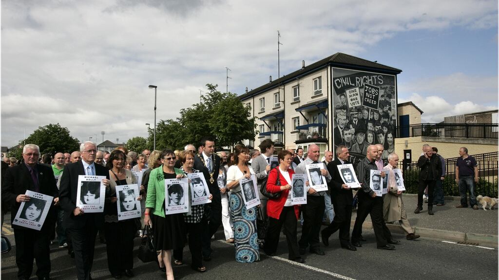 Family members of those shot dead and wounded on Bloody Sunday in June 2010, making their way from the Bogside to the Guild Hall ahead of the publication of the Bloody Sunday inquiry report in Derry. Photographer: Dara Mac Dónaill