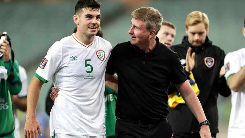 Ireland manager Stephen Kenny celebrates after the game against Azerbaijan in Baku with skipper John Egan. Photograph: Laszlo Geczo/Inpho