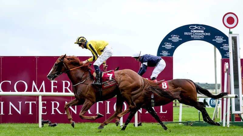 Ben Coen onboard Sonnyboyliston crosses the finish line to win the Irish St Leger at the Curragh. Photo: Ryan Byrne/Inpho