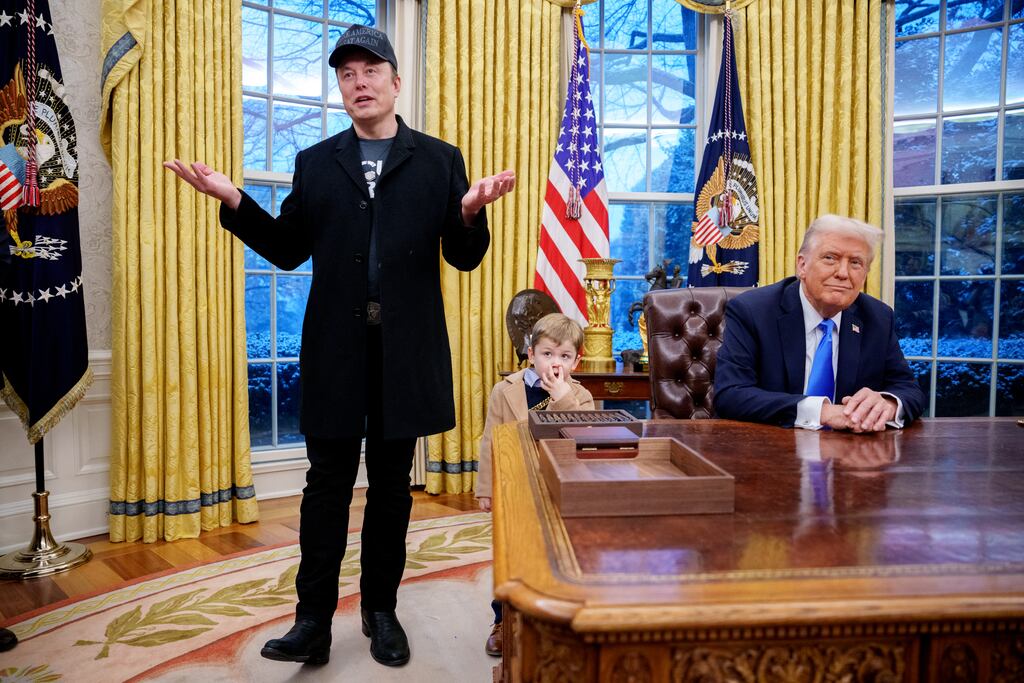 Elon Musk, accompanied by son X Musk and Donald Trump, speaks at the Oval Office at the White House in February. Photograph: Andrew Harnik/Getty