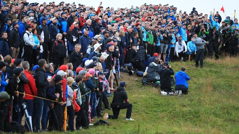 Rory McIlroy plays his second on the 17th during his second round 67 at Portrush. Photograph: Andrew Redington/Getty