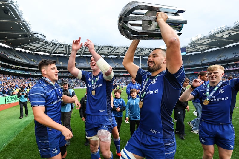 Leinster's Dan Sheehan, James Ryan, Max Deegan and Tommy O'Brien celebrate with the URC trophy at Croke Park. Photograph: Ben Brady/Inpho