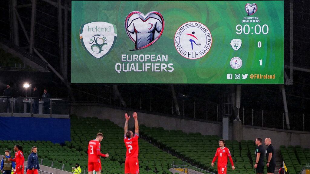 Luxembourg players react at the final whistle of the World Cup qualifier against the Republic of Ireland at the Aviva stadium. Photograph: Ryan Byrne/Inpho