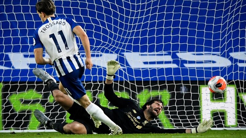 Leandro Trossard gives Brighton a lifeline on the stroke of half-time against Liverpool. Photograph: Daniel Leal Olivas/EPA