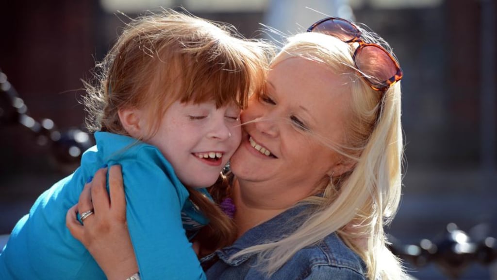 Support role: six-year-old Lucy Fagan, who is affected by autism, with her mother, Genevieve, at the launch of the Blue Nose fundraising campaign for Irish Autism Action. Photograph: Eric Luke