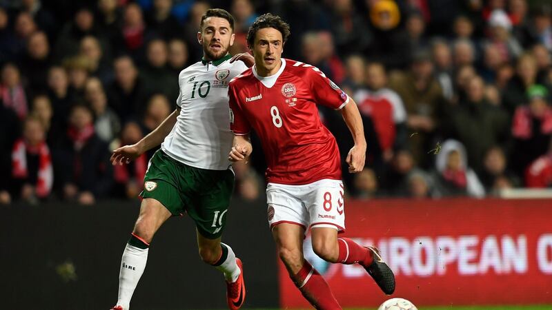 Robbie Brady challenges Denmark’s Thomas Delaney during Saturday’s draw in Copenhagen. Photograph: Lars Moeller/EPA